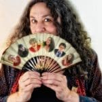 photo of Sherry Glaser holding fan