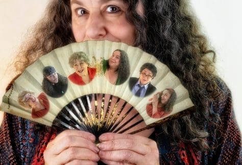 photo of Sherry Glaser holding fan